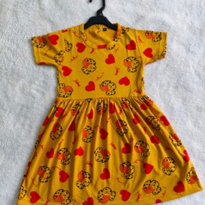 kids frock yellow with red hearts