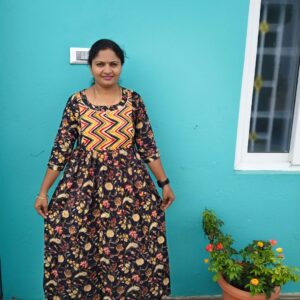 Feeding Kurtis black color with yellow flowers
