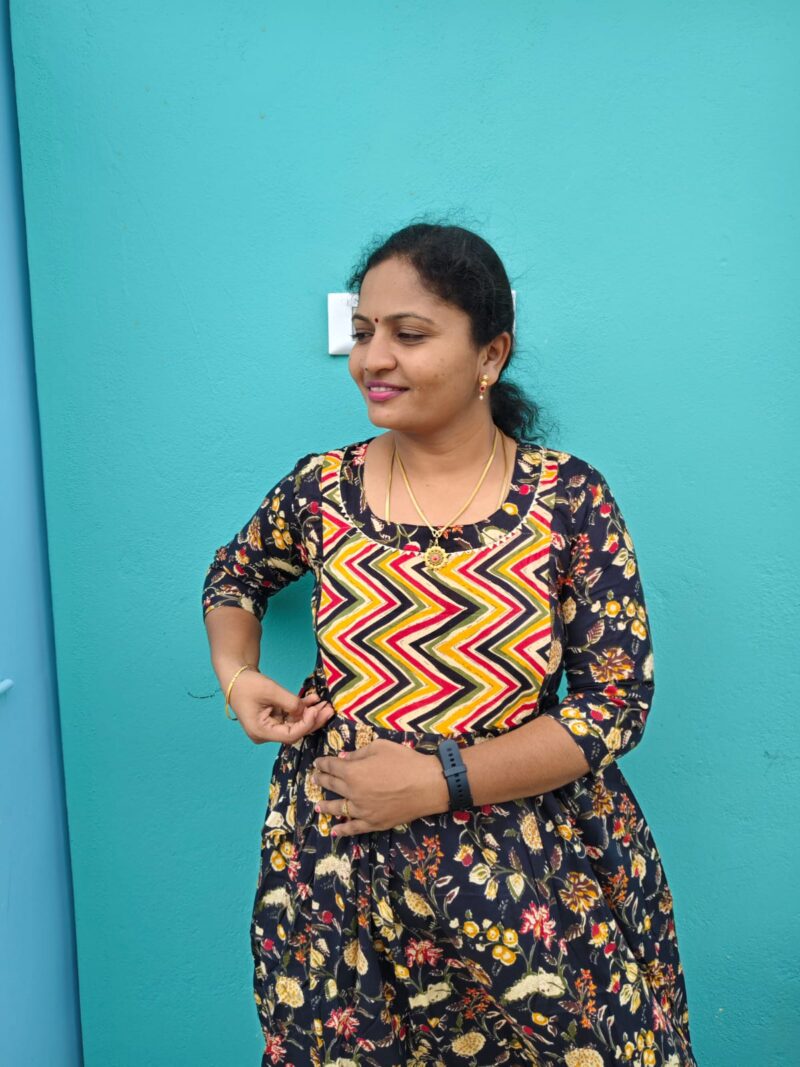 Feeding Kurtis black color with yellow flowers