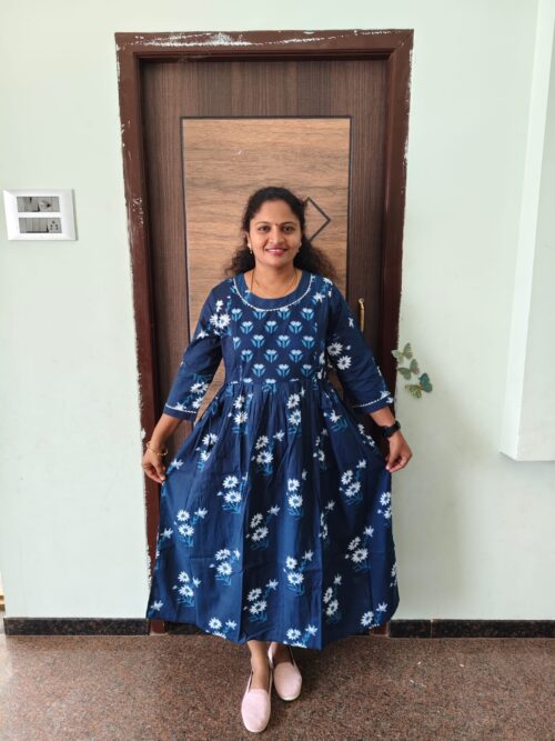 Feeding Kurtis navy blue color with white flowers